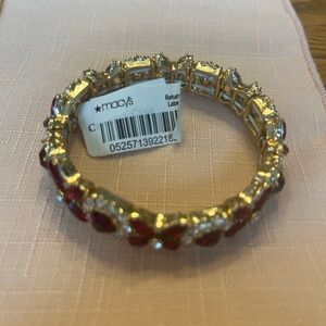 Elegant Gold and Red Bracelet